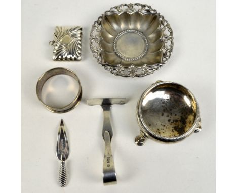A group of variously hallmarked silver items to include a circular pierced and embossed pin dish, T Beardsmore, Birmingham 19