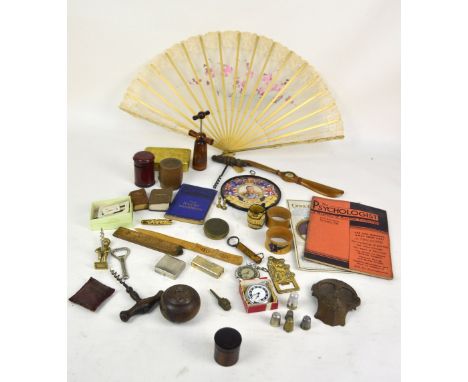 A quantity of collectors' items to include an Art Nouveau spelter inkwell, novelty corkscrews, wooden propeller keepsake, a W
