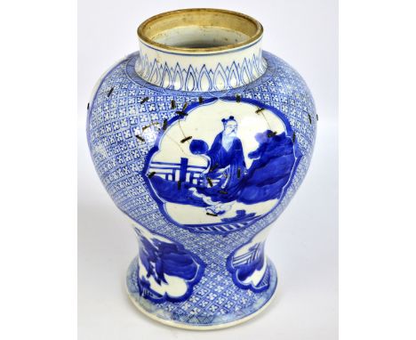 A large Chinese blue and white baluster vase painted with vignettes depicting figures in various poses, double ring mark to b