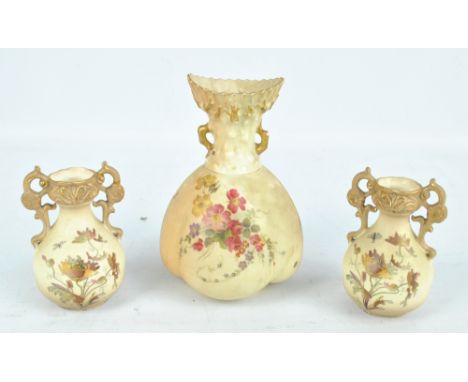 A late 19th century Royal Worcester blush ivory vase with painted floral decoration and gilt detail, puce mark to base with d