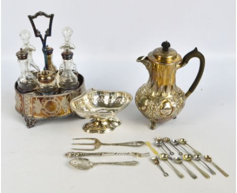 A small group of electroplated items to include a six piece cruet set stand, a baluster hot water jug, a lobed footed basket,