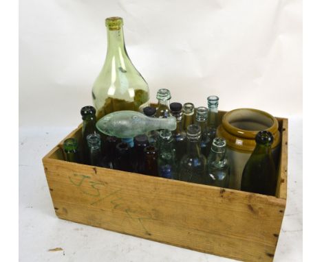 A group of late 19th/early 20th century glass bottles including 3 1/3 IMP. Quarts Martell cognac bottle, height 42cm, and a s