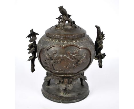 A Japanese Meiji period bronze globular urn and cover with cast finial modelled as an owl perched on branches and twin foliat