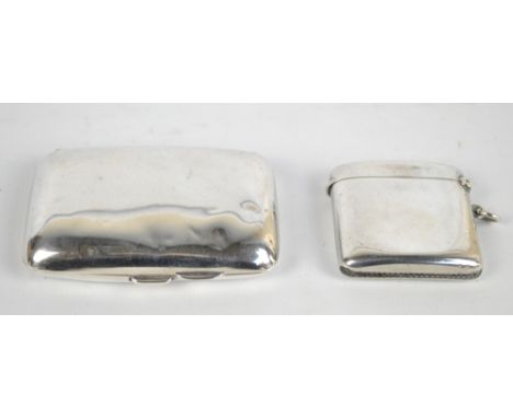 E.J TREVITT & SONS; a small George V hallmarked silver curved rectangular cigarette case, Chester 1916, 7.5 x 5cm, and a simi