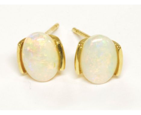 A pair of 14ct yellow gold and opal ear studs.