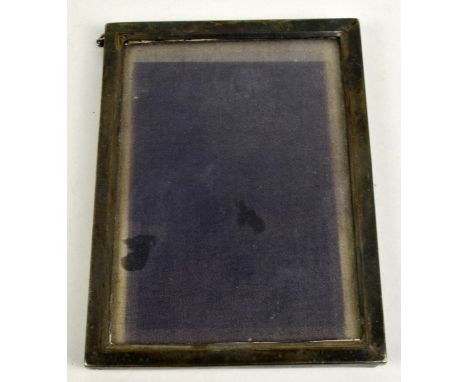 E MANDER & SONS; a Victorian hallmarked silver photo frame of plain rectangular form, Birmingham 1900, aperture 13.5 x 9.5cm 