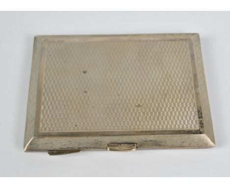 S BLANCKENSEE & SON LTD; a George V hallmarked silver rectangular overall engine turned decorated cigarette case, Birmingham 