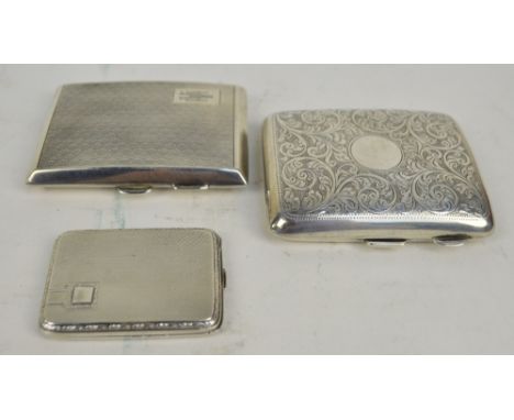 WILLIAM NEALE LTD; a George V hallmarked silver curved rectangular cigarette case overall engraved with foliate scrolls, cent