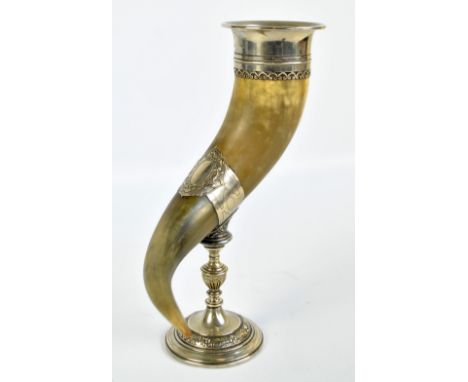 WMF; a circa 1900 electroplated mounted buffalo horn vase on baluster stem above spreading circular floral and foliate decora