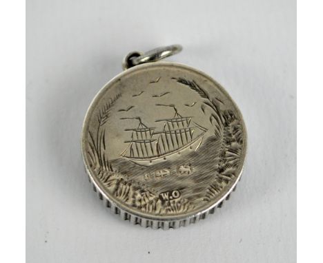 WILLIAM OLIVER; a hallmarked silver cased compass fob, engraved with masted ship, Birmingham 1893, diameter 2cm.