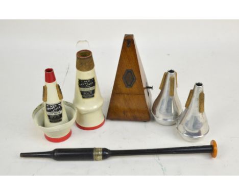 A Maelzel metronome and a group of various music accessories to include batons, mutes, mouthpieces, music clips etc.