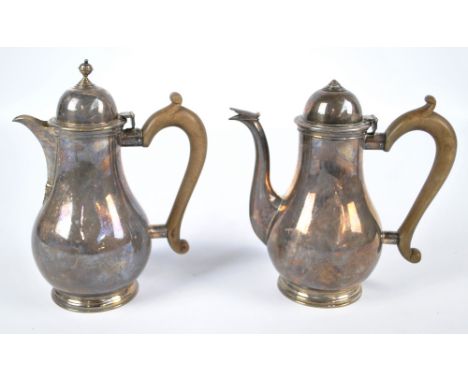 MAPPIN & WEBB; a George V hallmarked silver baluster coffee pot with wooden handle, height 19cm (lacking finial), and a match