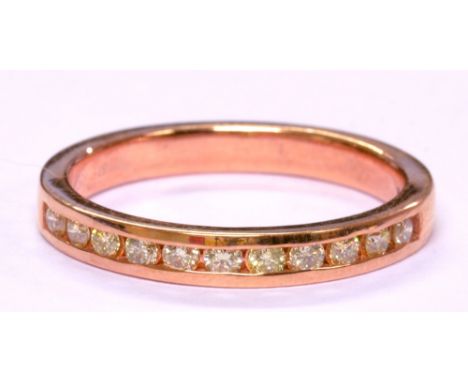 A 9ct rose gold half eternity diamond ring, size M, approx 2.2g.