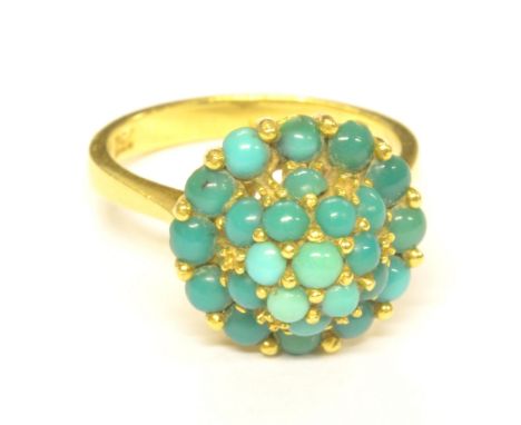 A 14ct yellow gold and turquoise domed ring, ring size O, approx 6.5g.