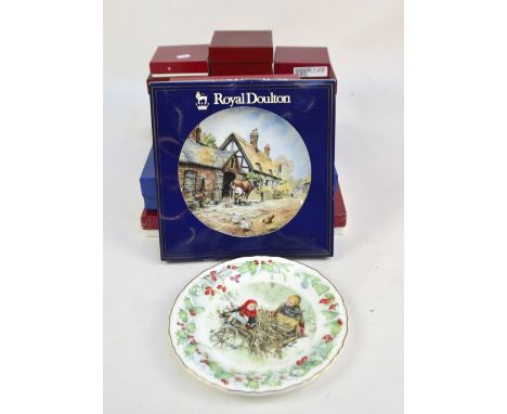 A small group of ceramics including two Royal Worcester 'Holly Ribbons' pattern cake stands, a Royal Doulton 'Village Life' s