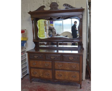 A late Victorian walnut mirror back sideboard with carved foliate detail, width 151.5cm.