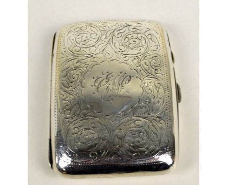 JOSEPH GLOSTER LTD; a George V hallmarked silver rectangular cigarette case overall engraved with foliate scrolls, centred wi
