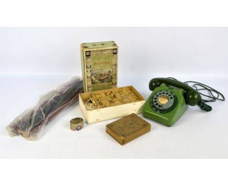 A boxed set of mah jongg playing cards set, and a pung wo junior game with four tile racks, also a vintage telephone with spi