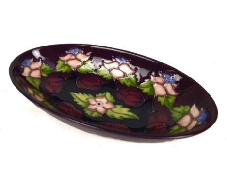 MOORCROFT; a 'Morello Cherry' pattern tubeline decorated bowl with green painted and impressed marks to base and year cipher 