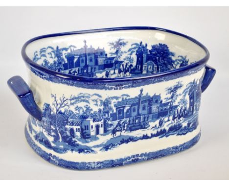 A Victoria ware ceramic transfer decorated twin handled foot bath, 41 x 31.5cm.