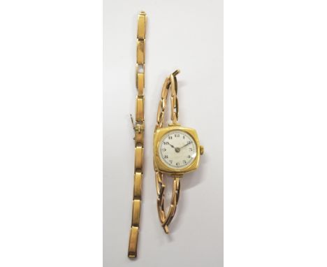 A lady's vintage 18ct yellow gold cased wristwatch with Arabic numerals to the circular white enamel dial on expandable brace