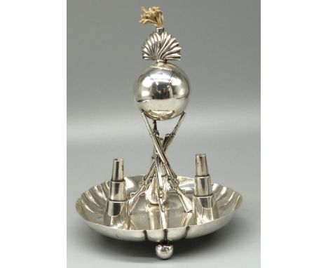 Victorian hallmarked silver Mess table lighter, with ball grenade on three crossed rifle supports and circular base with tape