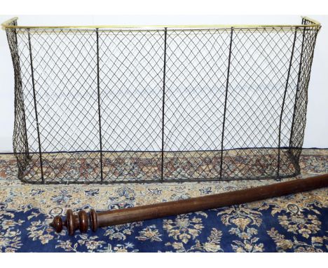 Victorian mahogany curtain pole with ring and spire turned finials, L230cm and a C20th D shaped wire fireguard, with brass to