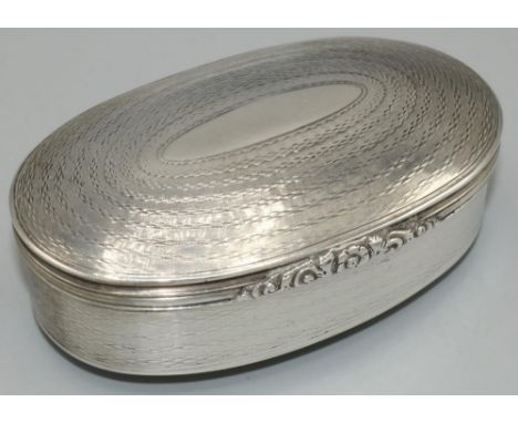 Victorian hallmarked engine turned silver oval table snuff box, hinged lid with vacant oval cartouche and cast thumbpiece, in