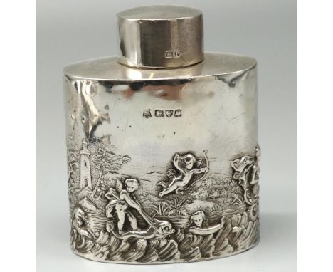 Victorian hallmarked silver tea caddy, oval body repousse decorated with Putti in a seascape, by George Nathan &amp; Ridley H