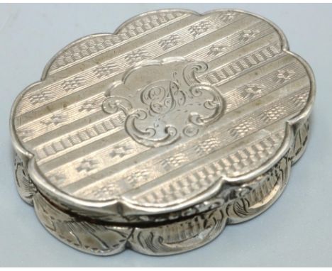 Victorian hallmarked silver shaped oval vinaigrette, hinged cover with an initialled scroll cartouche on an engine turned str