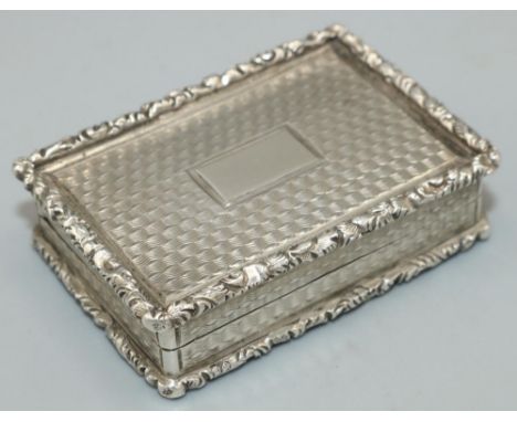 William IV hallmarked silver rectangular vinaigrette, engine turned with cast border, hinged cover with vacant cartouche, gil