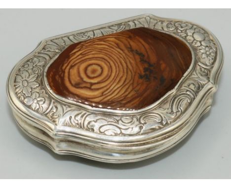 George III serpentine D shaped table snuff box, hinged lid inset with a polished brown agate panel with in border, base engra