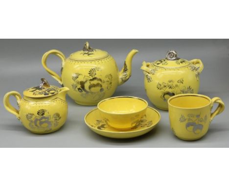 Leeds Pottery tea service, decorated in silver lustre with fruit and foliage on a yellow ground, comprising bullet shaped tea