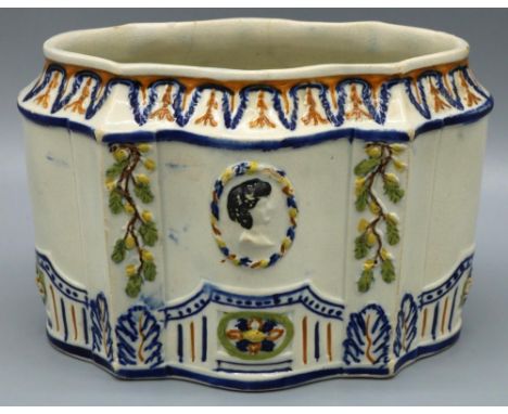 C19th Prattware shaped oval tea caddy, relief decorated with anthemion and portrait medallion, W13cm 
