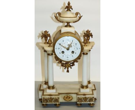 C19th French white marble and gilt metal mounted portico clock, the brass hour strike drum movement with white enamel convex 