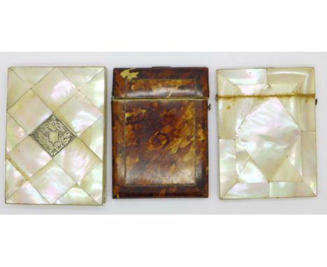 Two mother of pearl card cases and a tortoiseshell card case, (tortoiseshell hinge strained)
