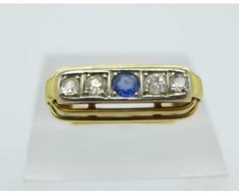 A 14ct gold Art Deco ring set with four diamonds and one sapphire, 4.5g, K, ring top 21mm across