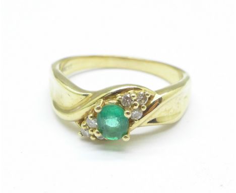 A 14k gold, emerald and diamond ring, 4.6g, R