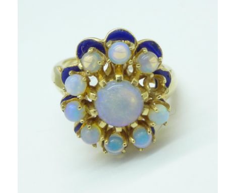 A 14ct gold, opal and enamel ring, lacking one opal, 8g, P