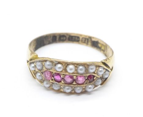A Victorian 15ct gold, pearl and ruby ring, 1.9g, N, inner shank scratched