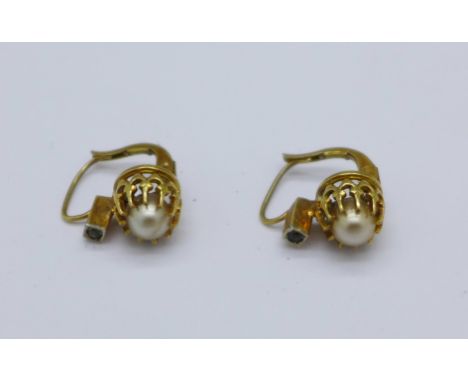 A pair of yellow metal and pearl earrings, 2.3g