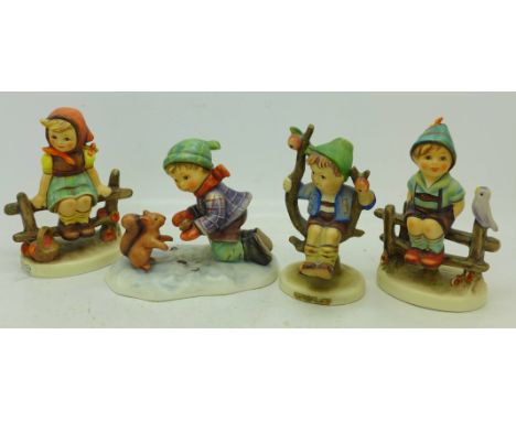 Four Hummel figures, boxed
