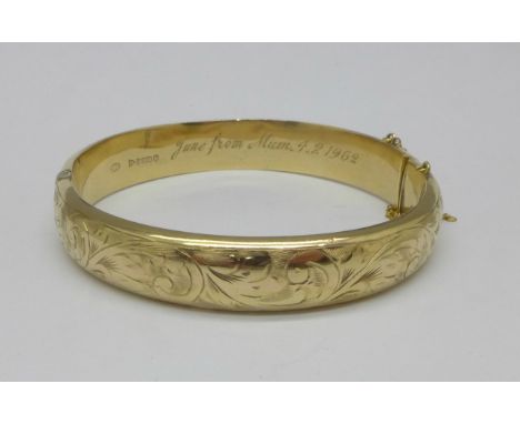 A 9ct gold bangle, 11.5g