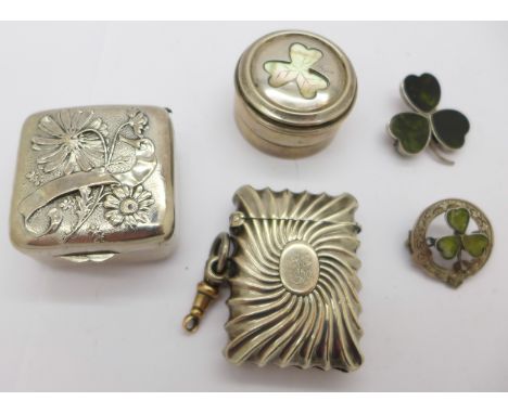 A hallmarked silver pill box with mother of pearl shamrock, two silver shamrock brooches, both lacking pins, a Victorian silv