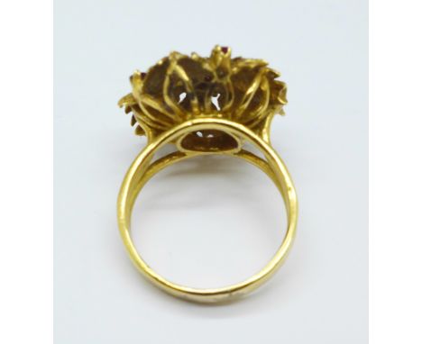 A large yellow metal and ruby ring, 10.6g, Q