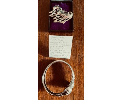 UNHALLMARKED SILVER BANGLE AND SILVER BROOCH
