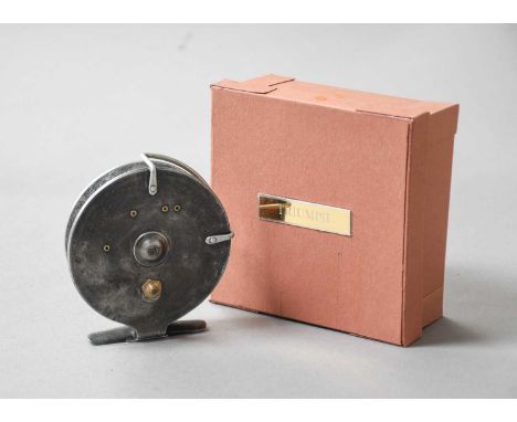 A Hardy Triumph  4" Centre Pin Reel with twin ebonite handles and on/off check.
