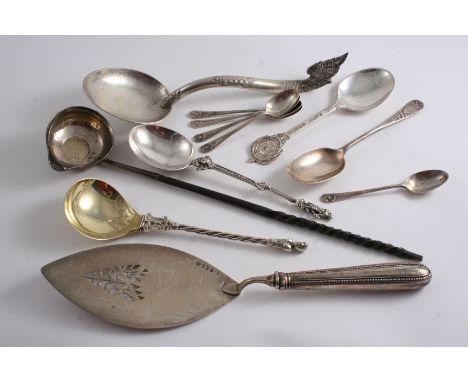 A GEORGE III PUNCH LADLE A George III fish slice, a set of five modern picture-back tea spoons (with a stag), three foreign s