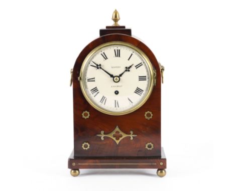 A VICTORIAN MAHOGANY BRASS INLAID BRACKET CLOCK WITH BRACKET (2)With domed case with brass embossed twin handles, the white e