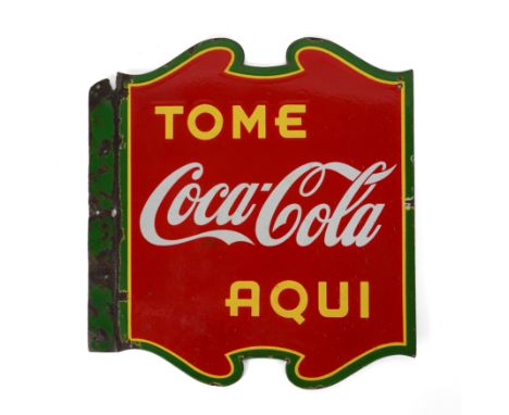 AN ENAMEL METAL COCA-COLA ADVERTISING SIGNCirca 1939
Decoration to both sides, 47 x 50cmProvenance:&nbsp;Acquired by present 